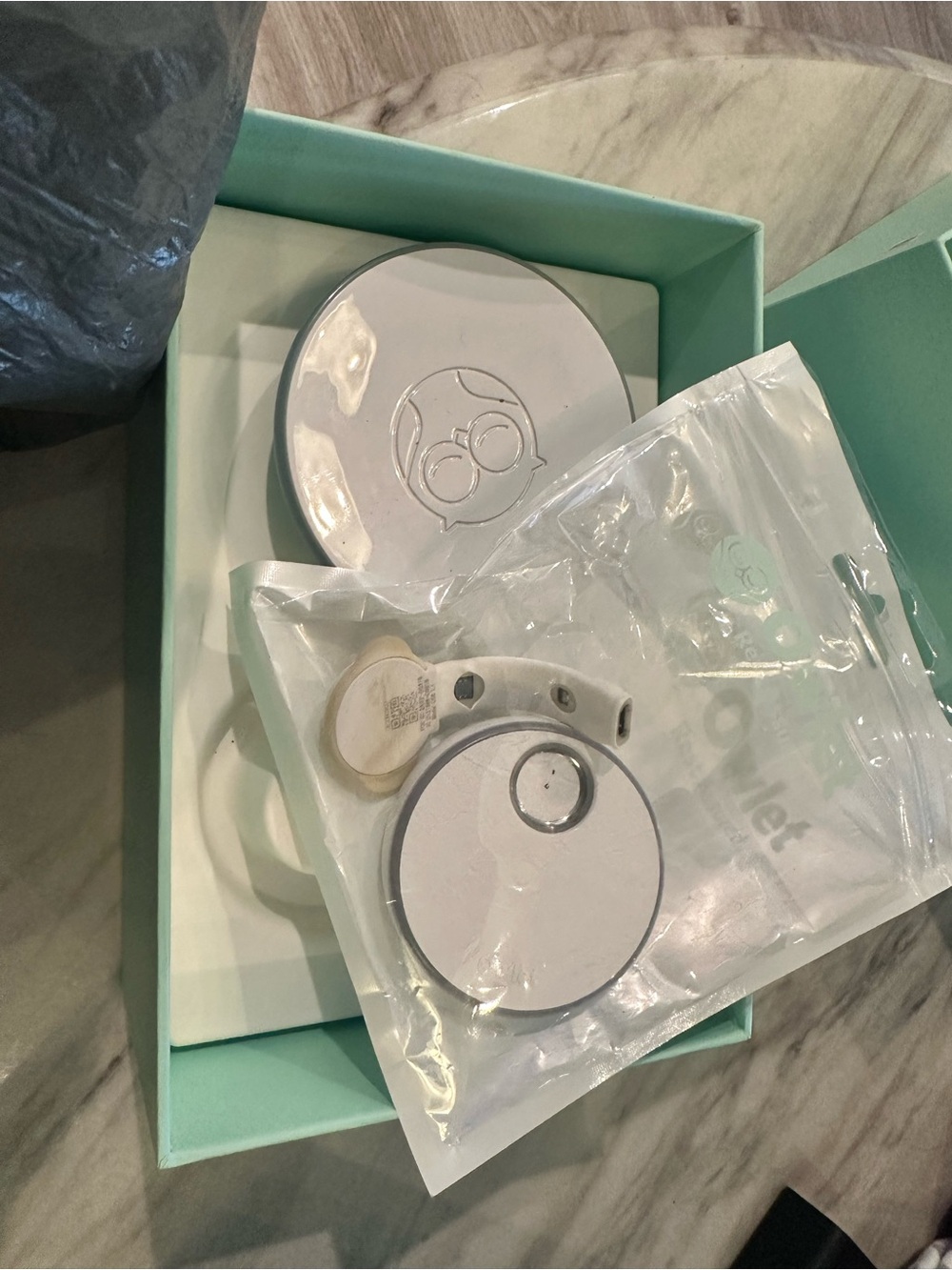 Owlet baby sleep monitor with multiple smart socks